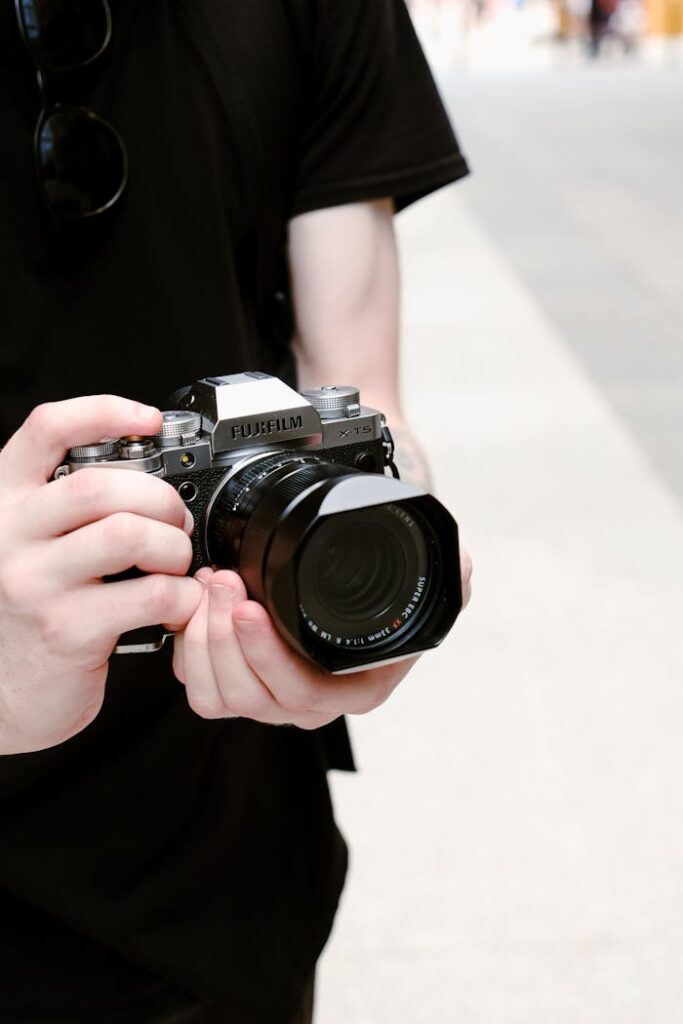 Hands with a Fujifilm Camera