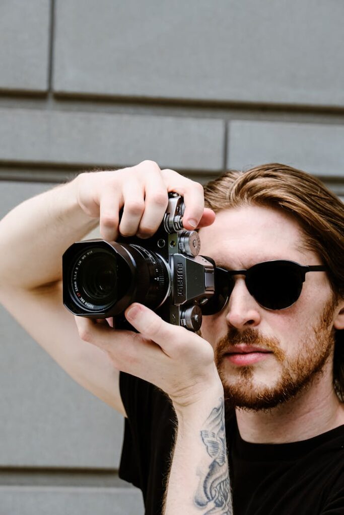 Guy using a Fujifilm Camera